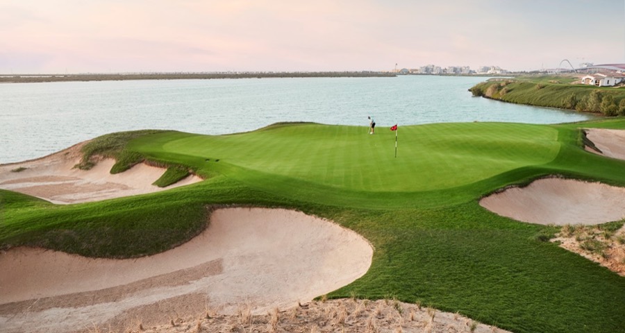 A green beside the water at Yas Links, Abu Dhabi