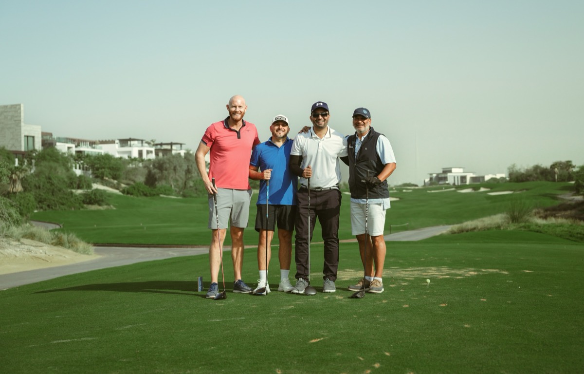Four members together on the tee at a UAE golf course